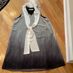 Askari Swing Sleeveless Dress in M.